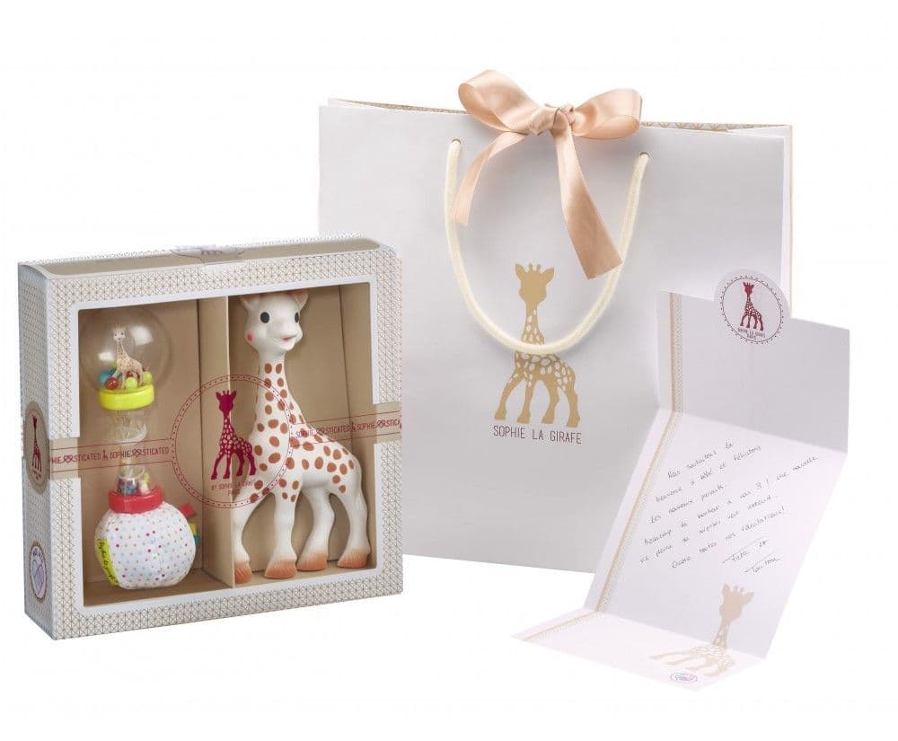 Maracas set packaging with Sophie the Giraffe toy, small bottle, and card
