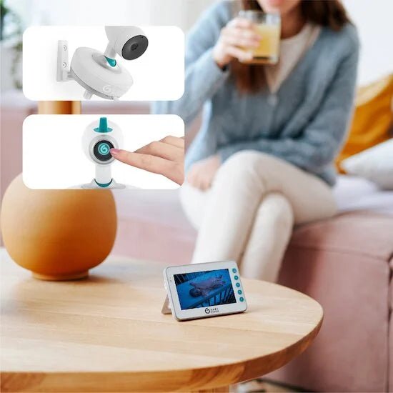 Yoo-Moov video baby monitor with wall-mounted camera and blue-accented handheld screen