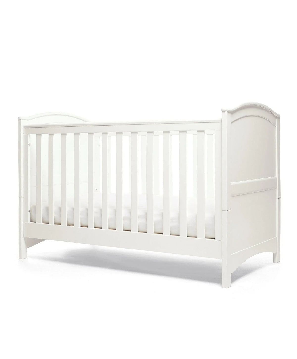 White cotbed with vertical rail sides and arched end panels.