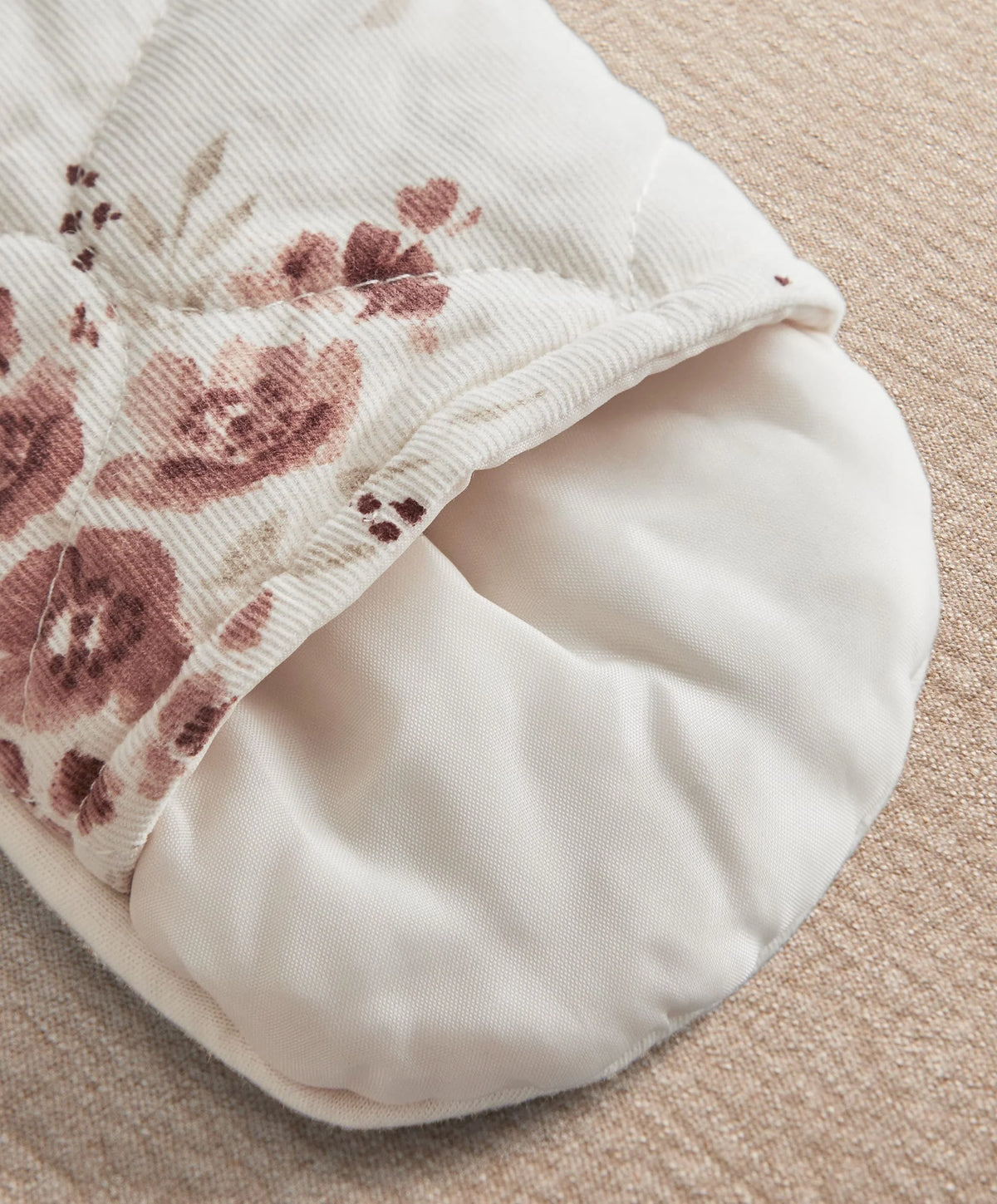 Ditsy print pramsuit boot-style foot with elastic trim and floral cuff