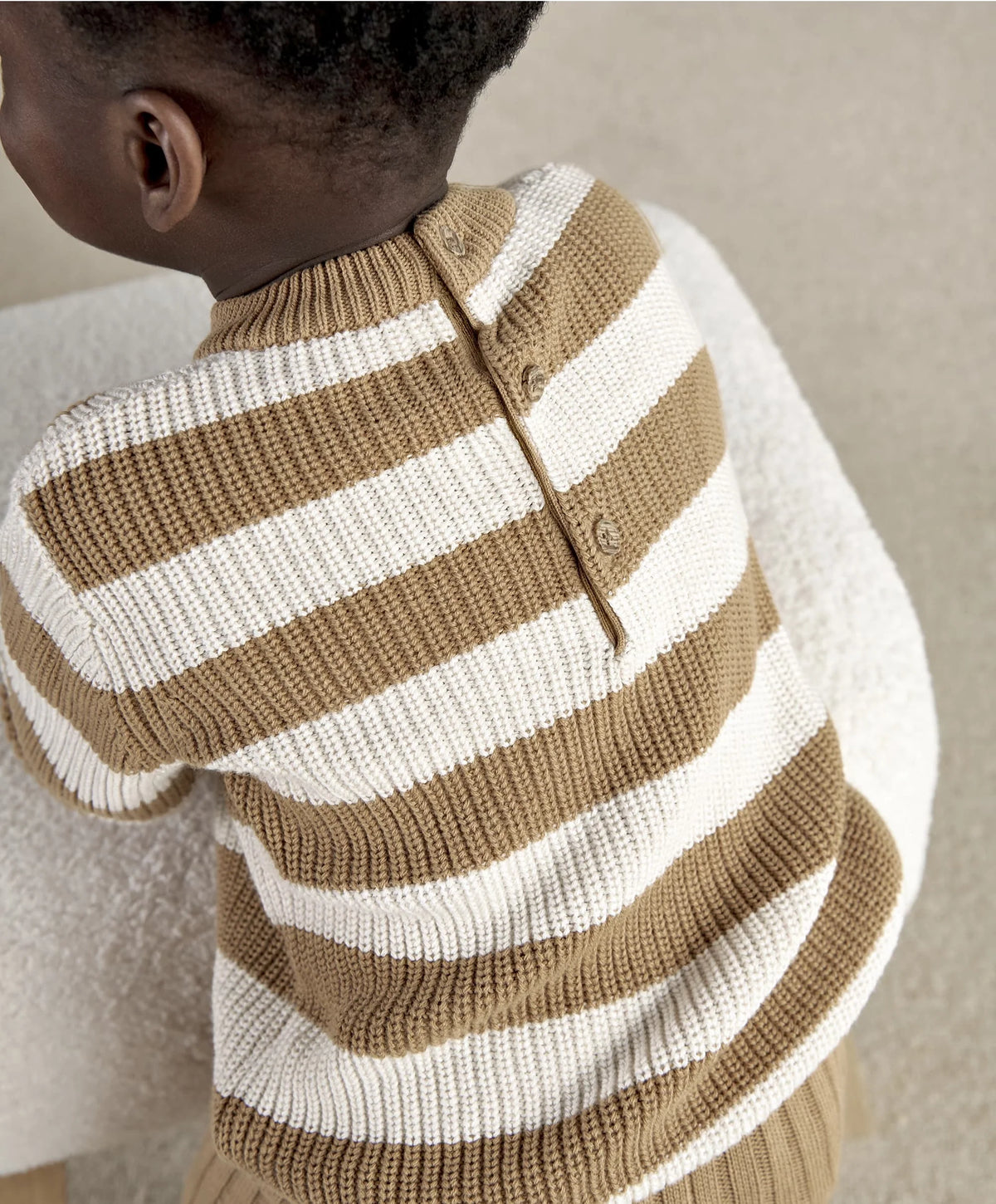 Striped knitted kids jumper and leggings set, tan and white stripes, close back view