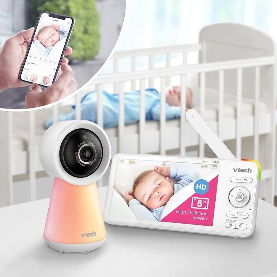 Baby monitor with smartphone live view, white camera on orange base, and 5-inch screen