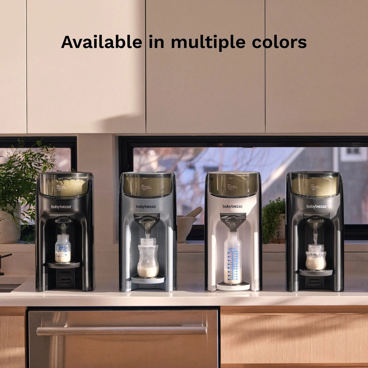 Black countertop formula dispenser with drip tray and front dispensing button