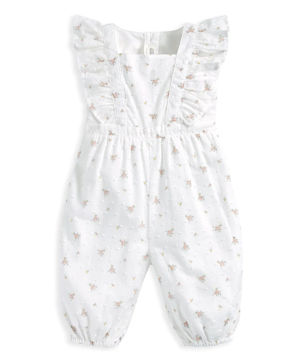 White baby dungarees with short ruffled straps and small scattered floral motifs