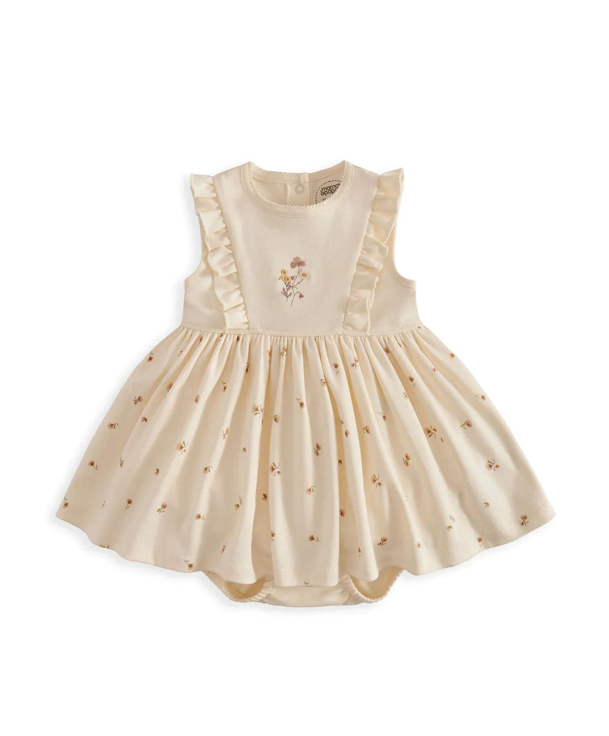 Cream mock skirt romper with gathered skirt and floral chest applique