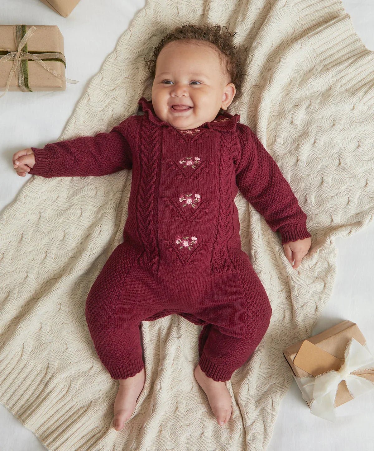 Burgundy soft knit romper with cable panel and heart embroidery long sleeves