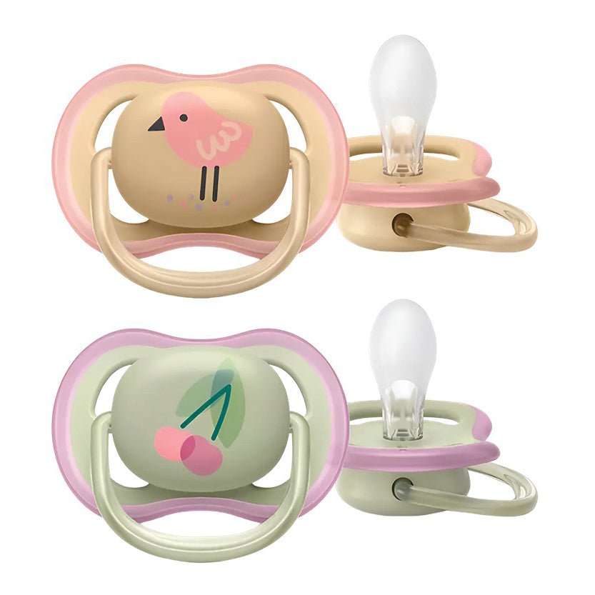 Double pacifier set with bird and fruit-style prints, pink and beige ring frames