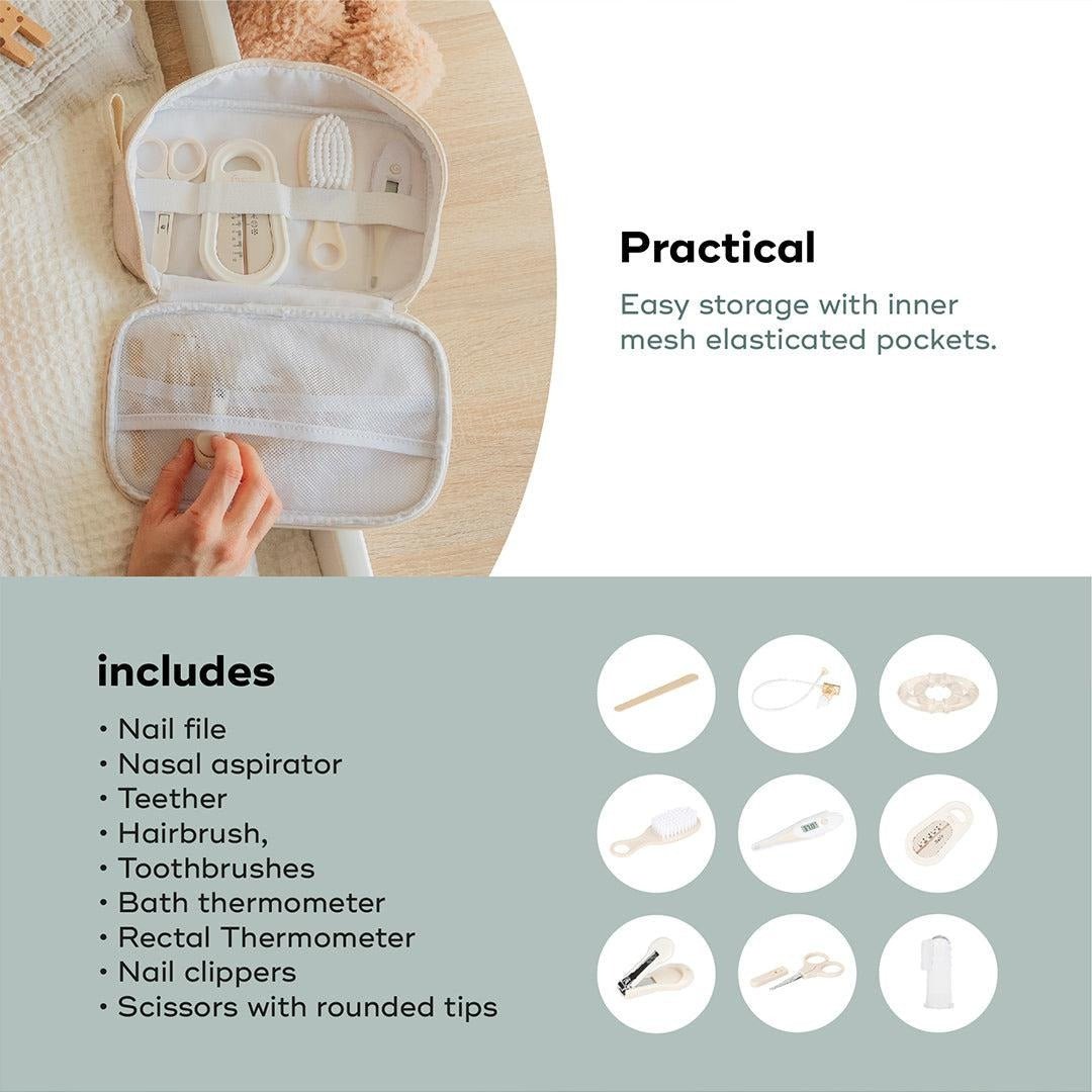 Open baby grooming set organizer with elastic pockets and grooming accessories