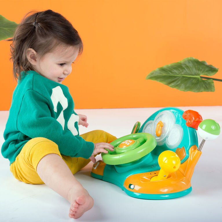 Turquoise baby steering wheel dashboard toy, angled view, with colorful lights and buttons