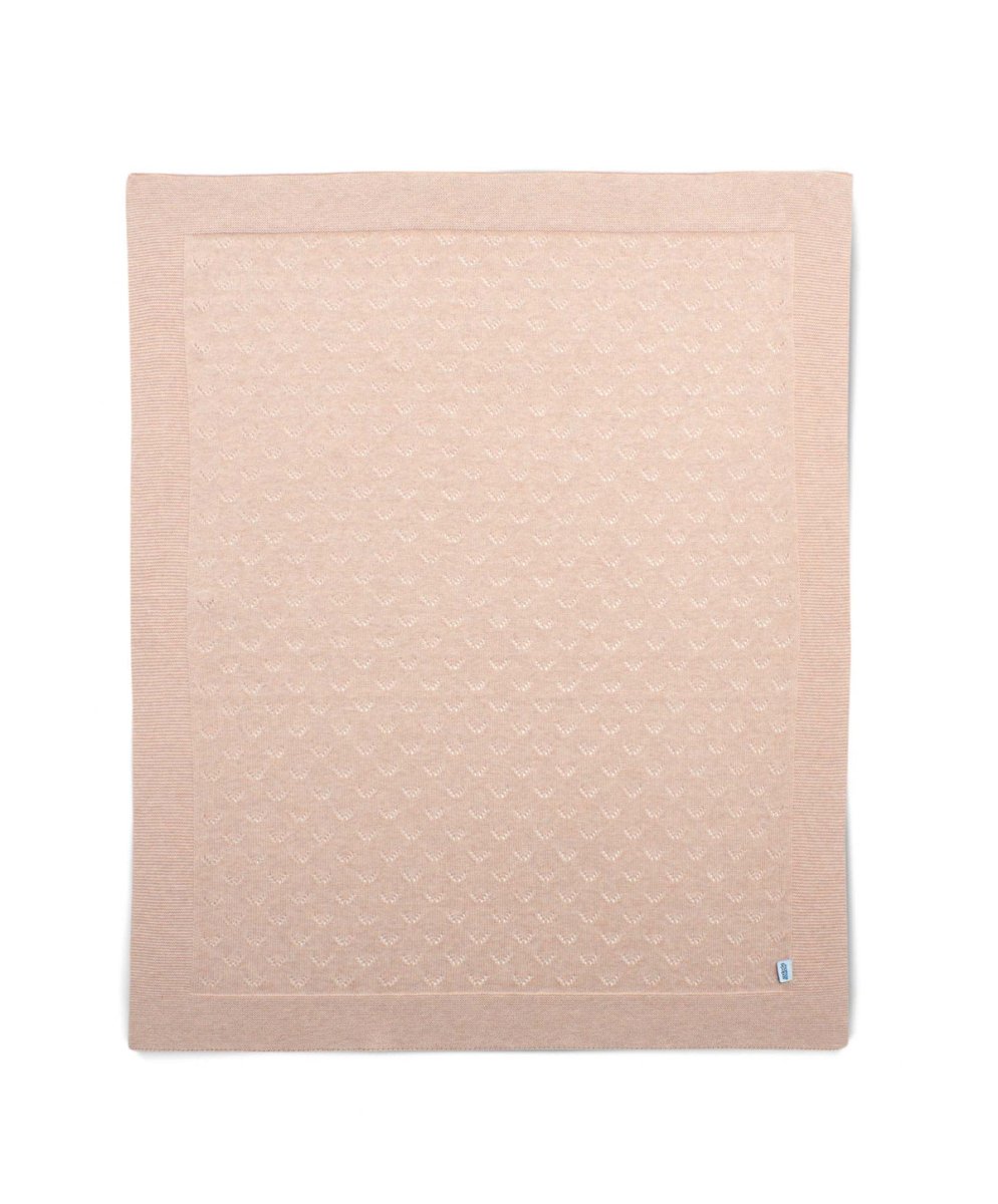 Pink pointelle baby blanket with textured geometric pattern, flat