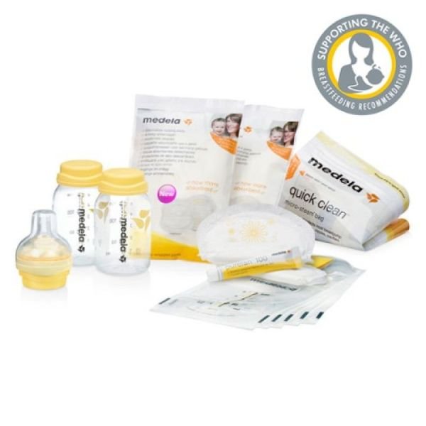 Breastfeeding starter kit with Medela bottles, breast pads, cleaning wipes, and instruction booklet
