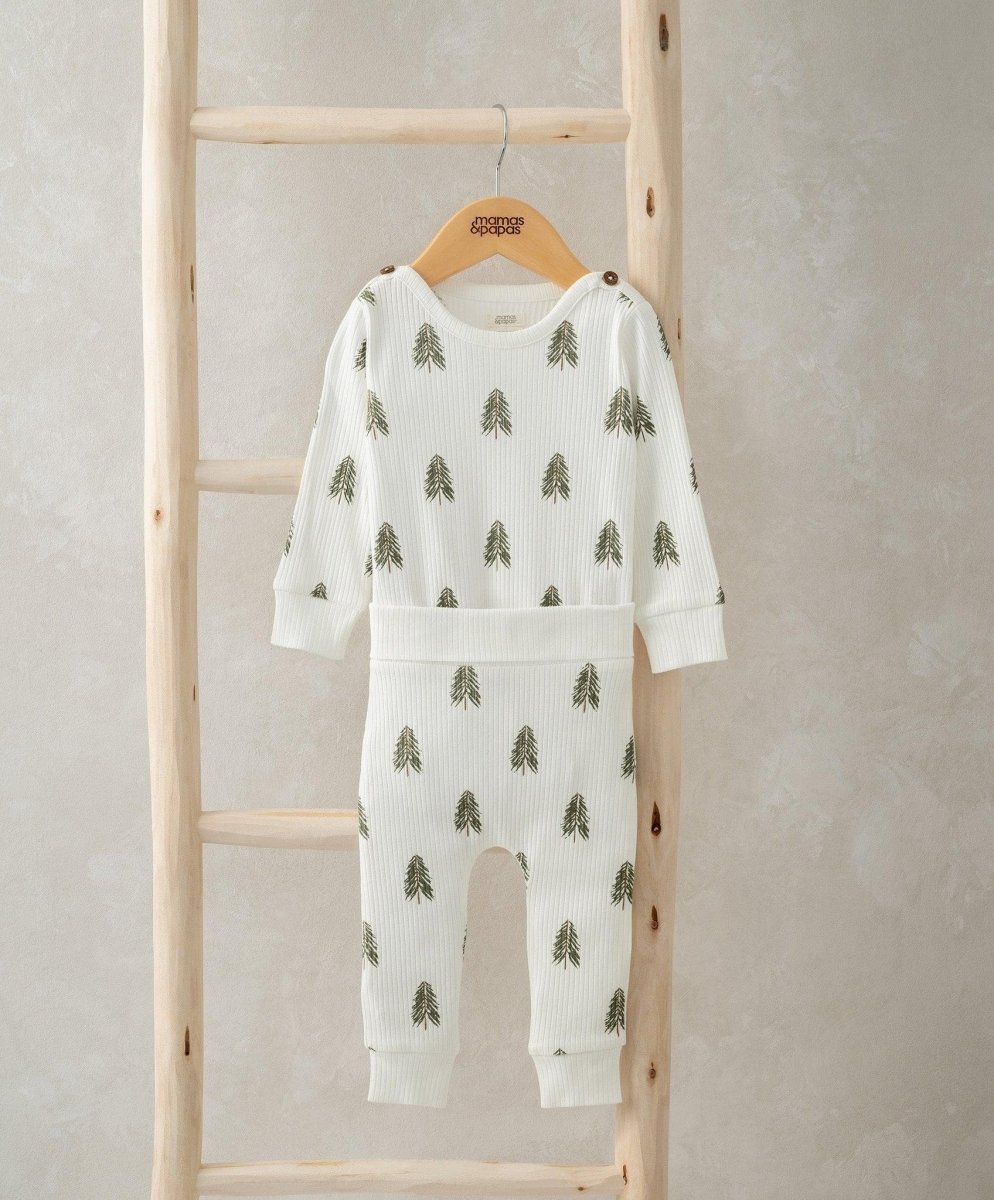 White knit bodysuit set with long sleeves and green Christmas tree prints, matching leggings