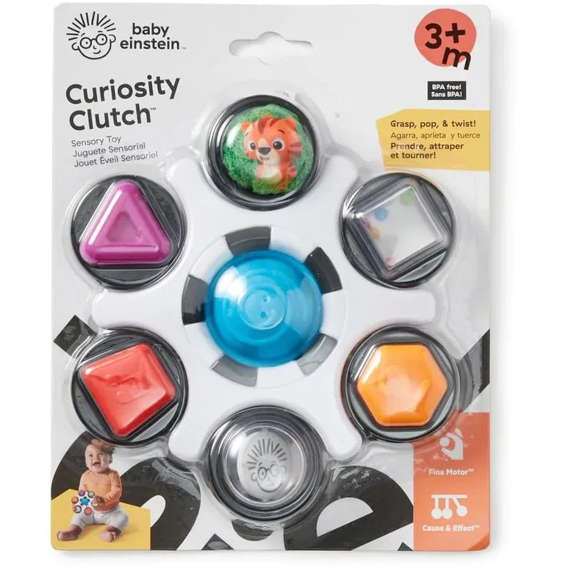 Sensory clutch toy package showing blue spinner and character button with textured sides