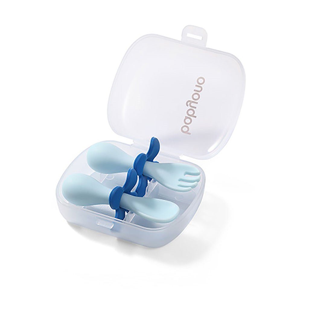 Ergonomic cutlery set with light blue spoon and fork in white hinged case