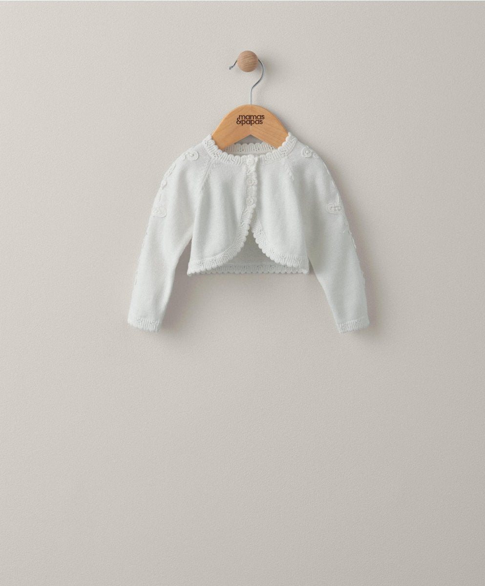 White lace-trim cardigan with scalloped lace bib front and lace hem