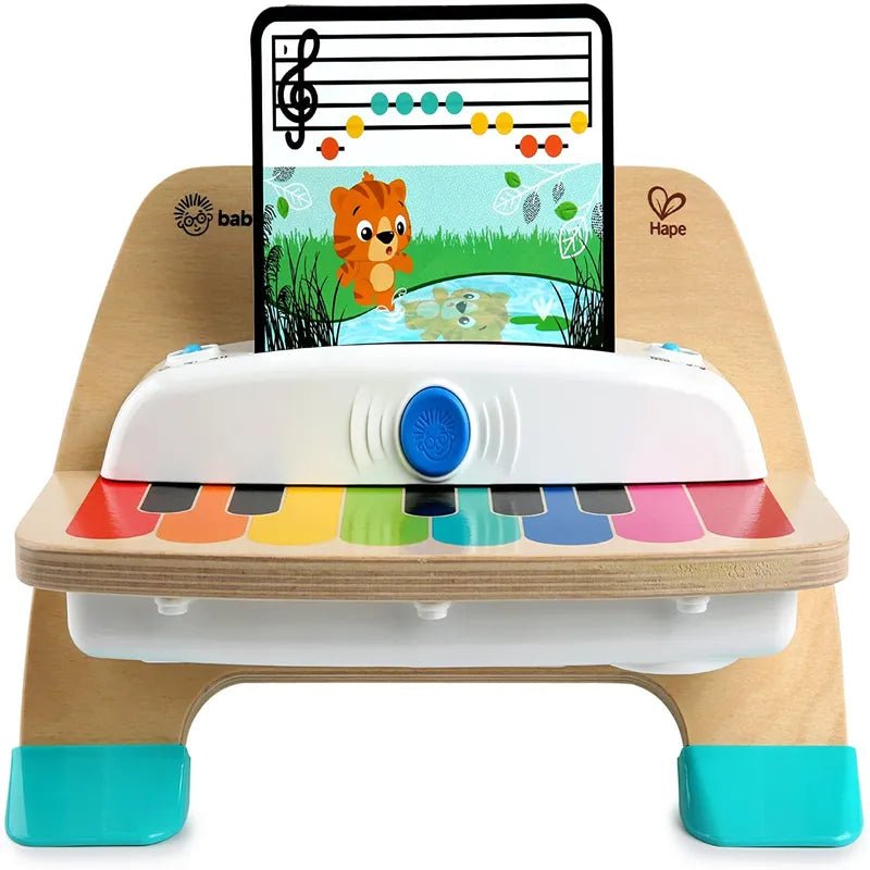Wooden baby piano toy with colorful keys, blue button, teal legs, and music screen