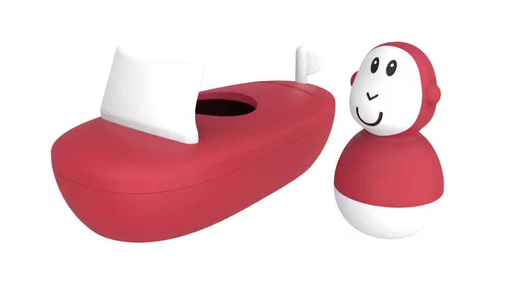 Monkey boat toy set in red and white with boat seat opening and small monkey figure