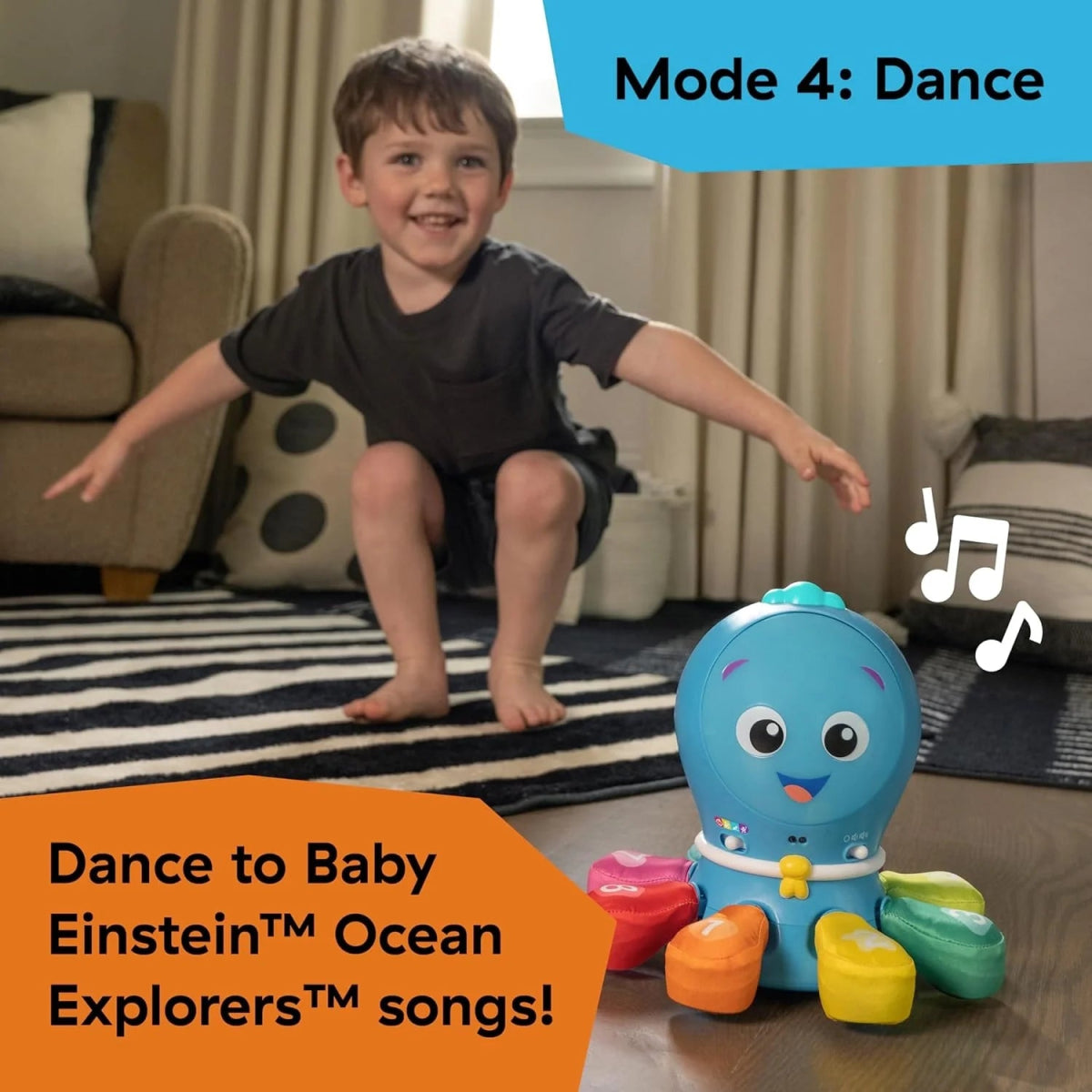 Blue Opus dance toy with colorful arm pieces and smiling whale face