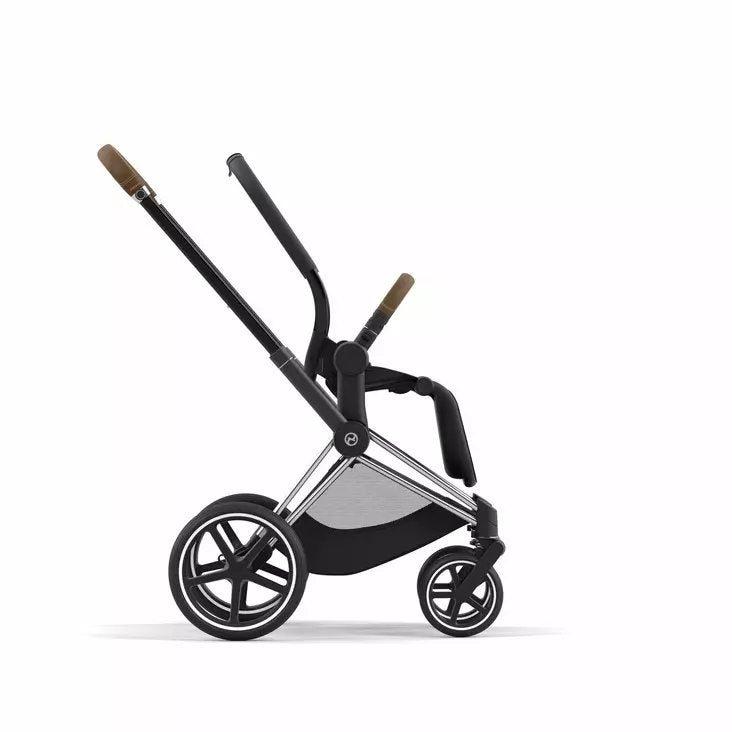 Chrome stroller frame with brown handle bars and black seat