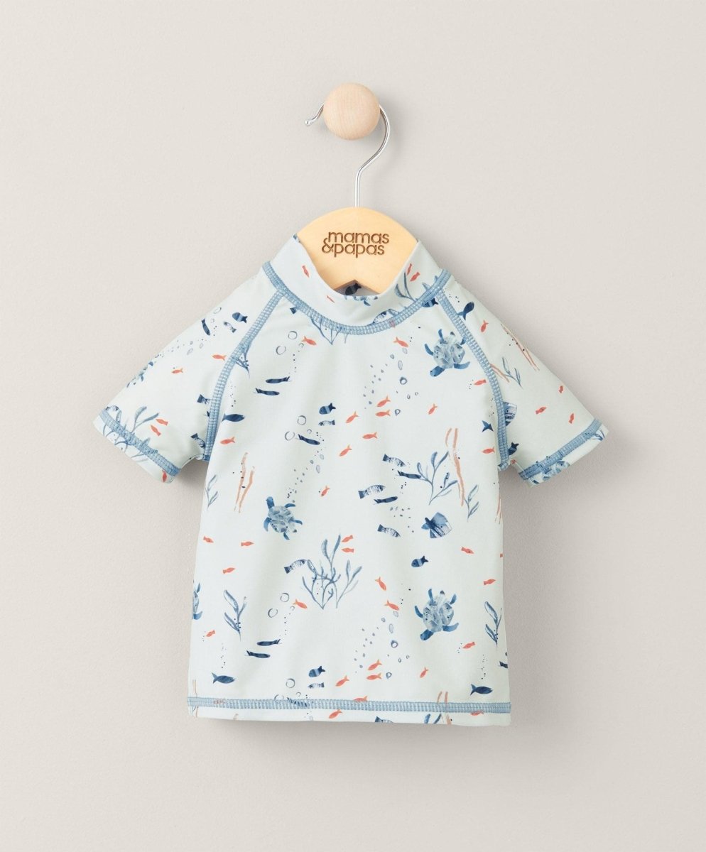 Short sleeve rash top swimwear with light blue sea-life print and crew neckline