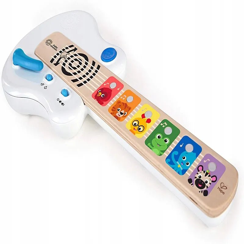 Toy guitar with white body, colorful animal sticker panel, blue buttons and strings