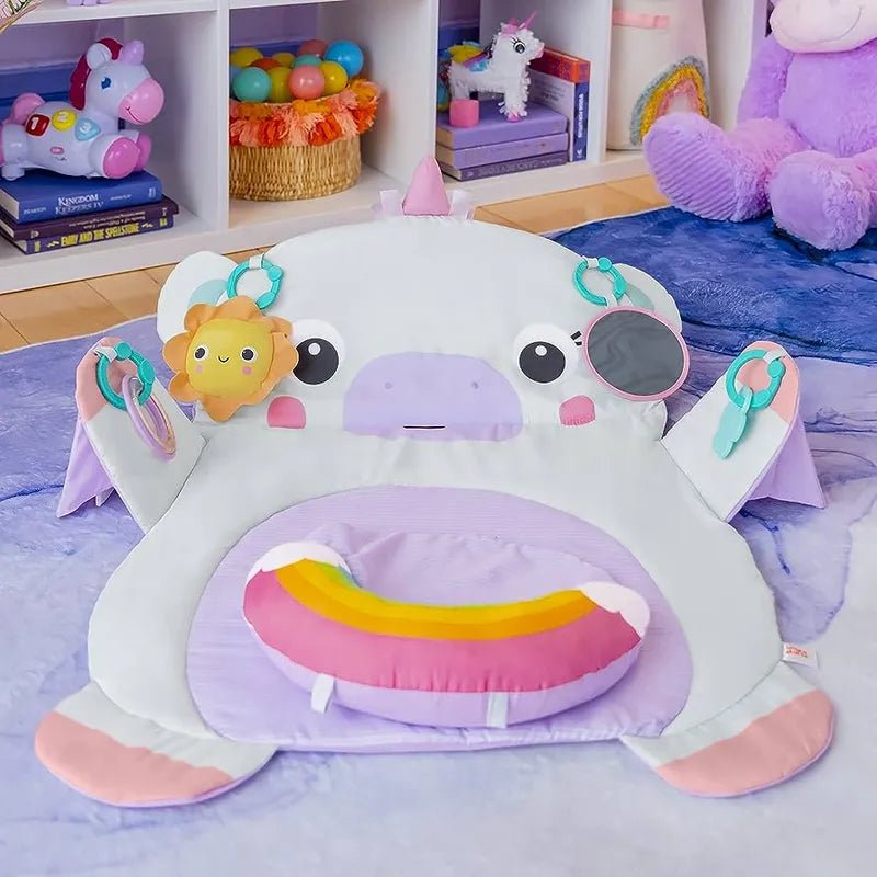 Unicorn play mat with plush face, mirror disc, and rainbow cushion insert