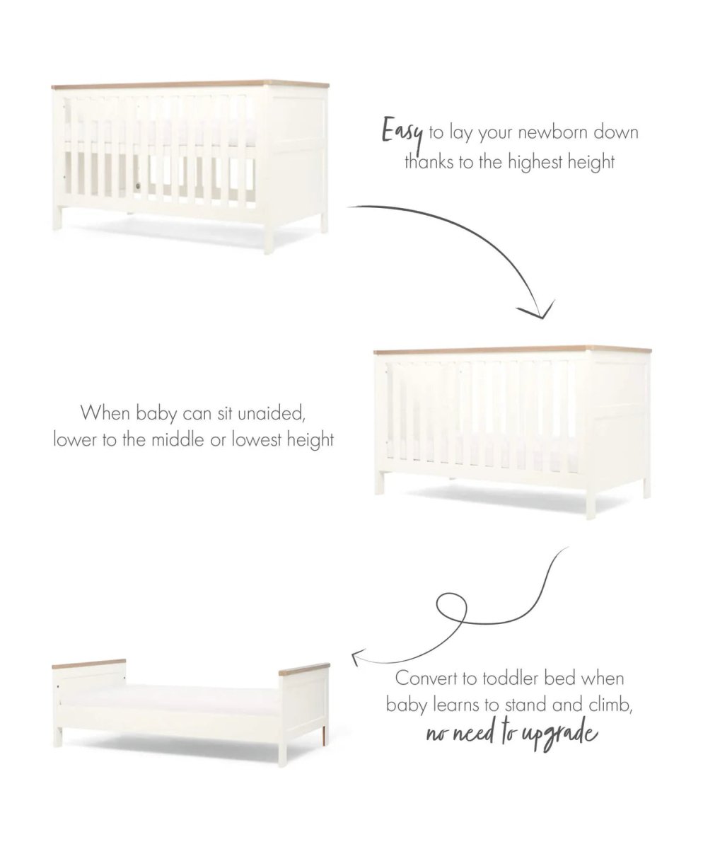 White cotbed diagram with slatted ends and guard rail