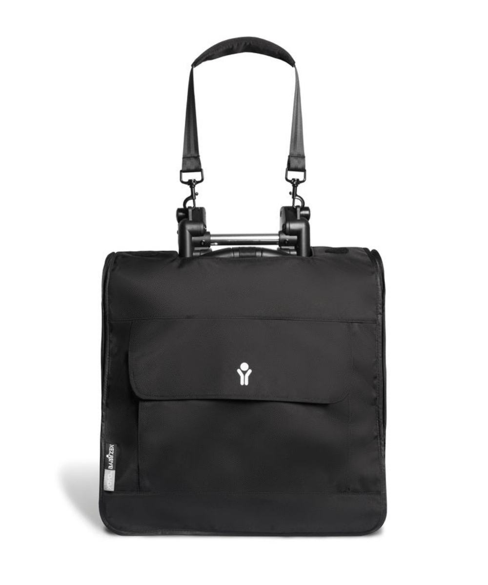 Black travel bag with front flap pocket and two top handles, Yoyo logo on front