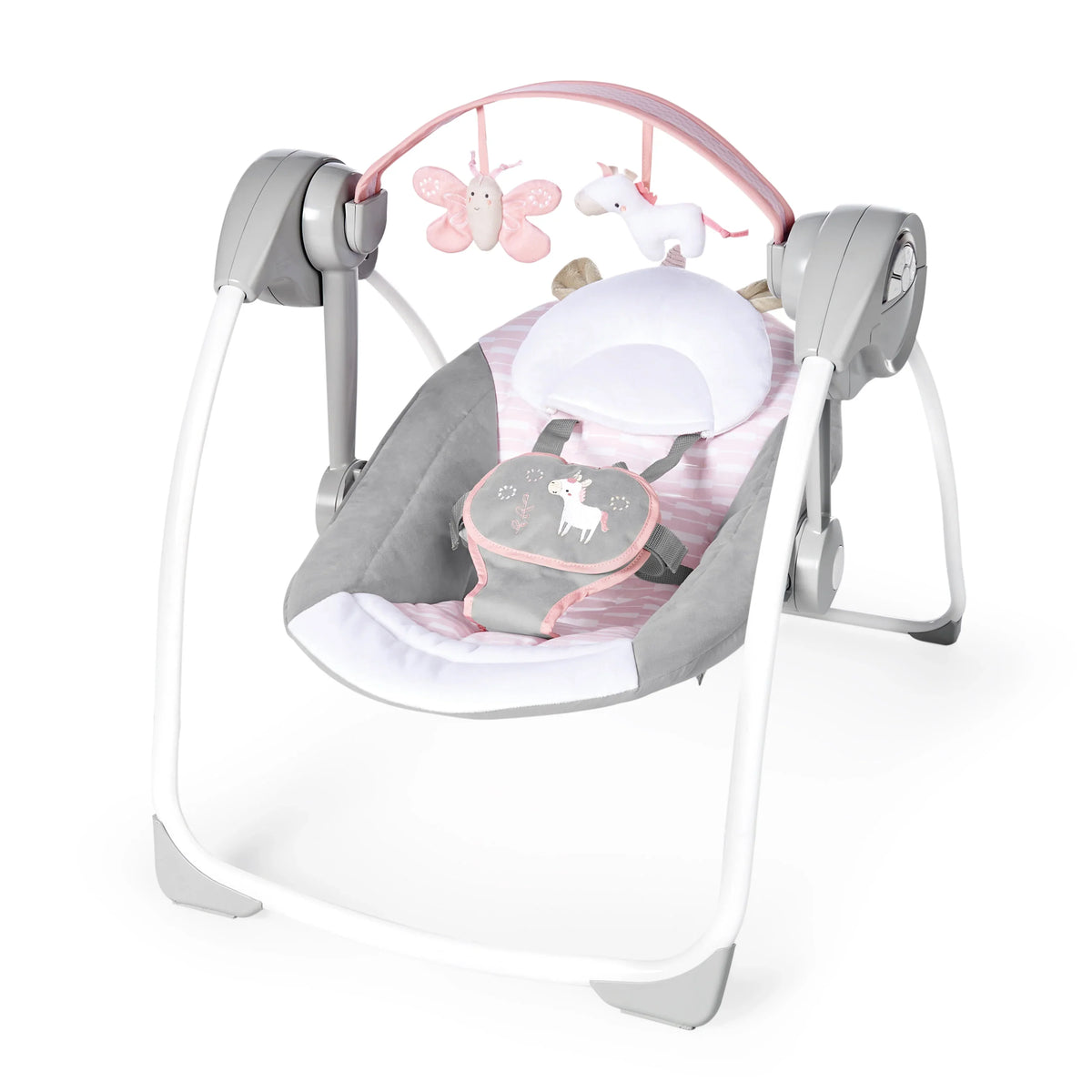 Gray portable baby swing with white base, pink canopy bar, and plush unicorn toy