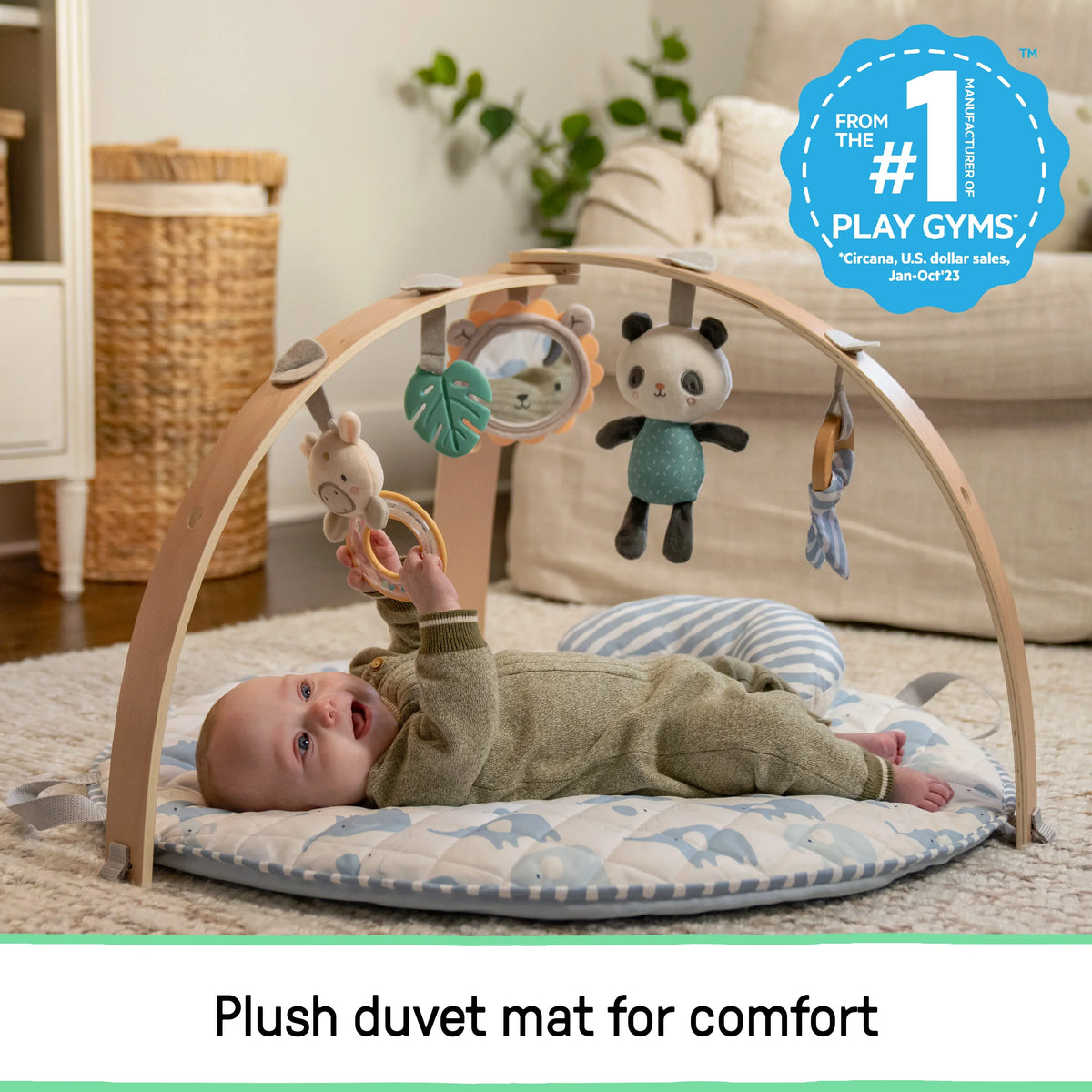 Baby activity gym with arch over plush elephant-pattern duvet mat with hanging panda