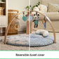 Baby activity gym with arch and hanging toys over reversible blue-and-white mat