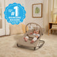 Pale beige infant rocker seat with reclined pad and hanging toy