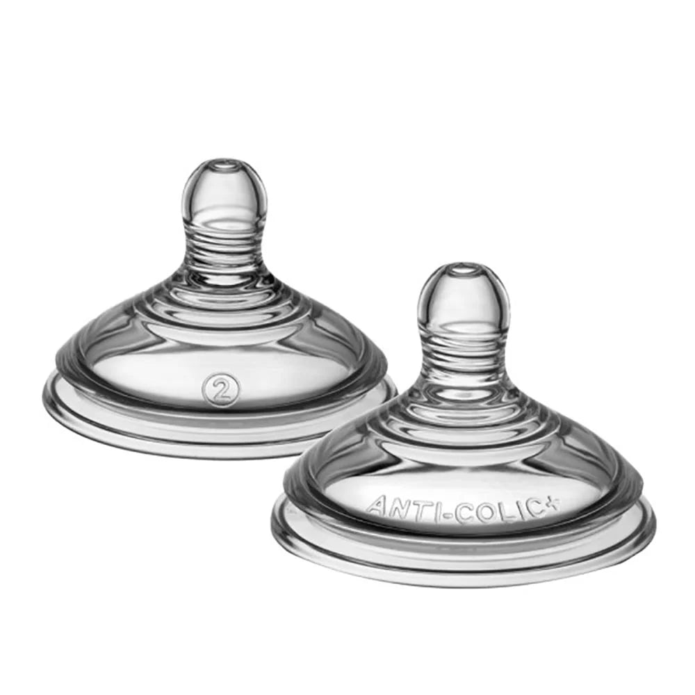 Two clear silicone anti-colic baby bottle teats with '2' and 'ANTI-COLIC' markings