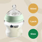Glass baby bottle with mint silicone collar, clear body, and star logo