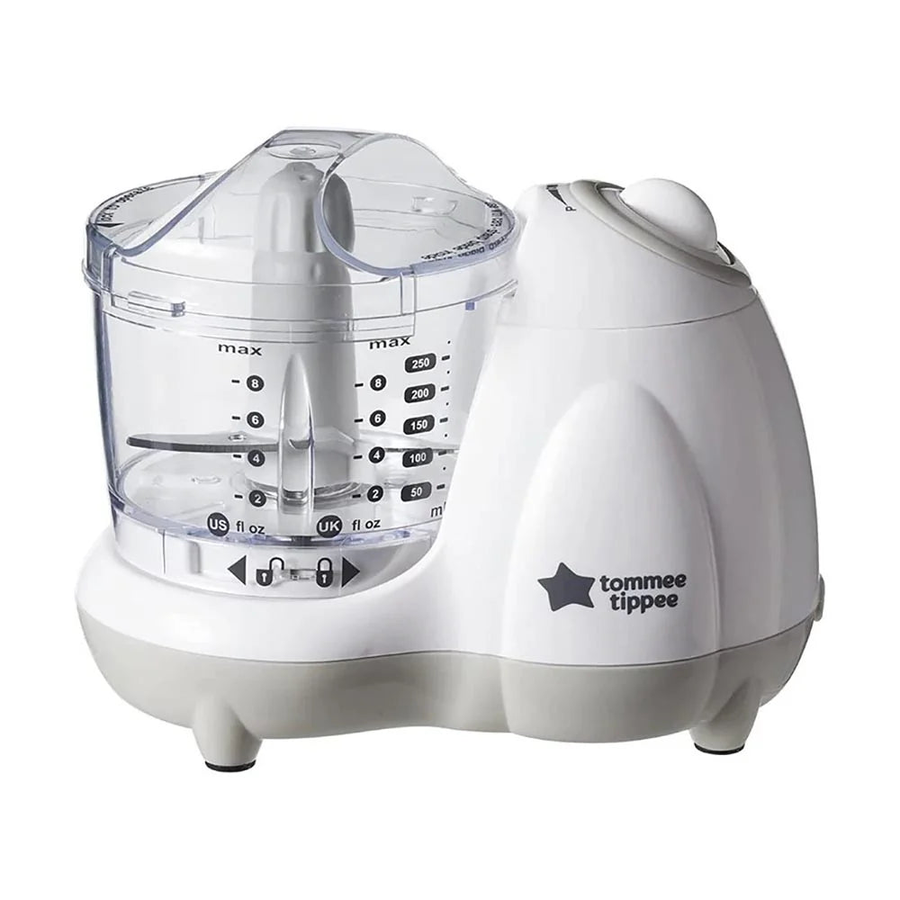 White baby food blender base with clear blending cup and max lines