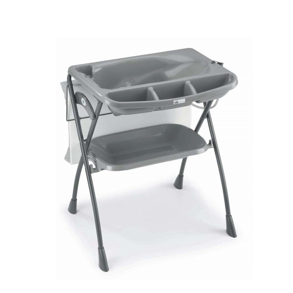 Baby changing station with grey bath tub tray and lower storage shelf