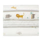 Nursery quilt fabric with scattered safari animals and subtle gray stripes