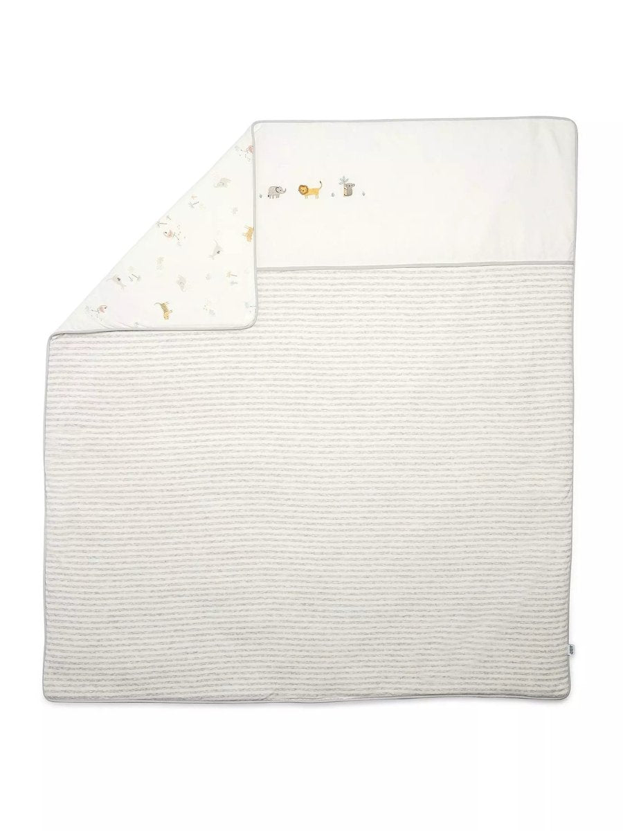 Nursery quilt with white and light gray striped panel and small animal print trim