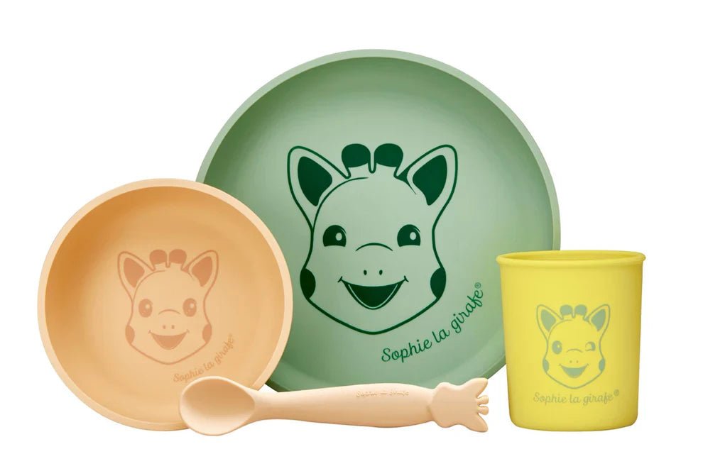 Silicone meal set with green plate, tan bowl, yellow cup, and matching spoon