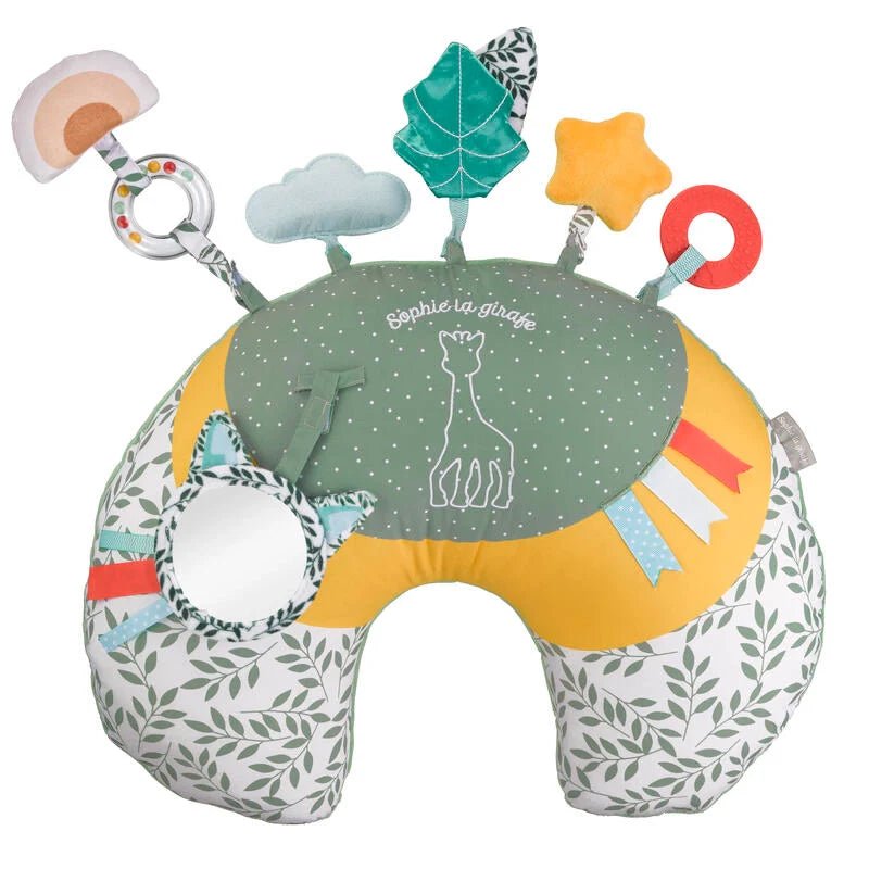 Cozy play cushion with green fabric and dangling leaf, animal and ring toys