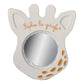 Giraffe-shaped magic mirror with gray frame, orange spots, and “Sophie la girafe” text