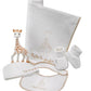 Newborn outfit set with quilted blanket, bib, socks, and small plush giraffe