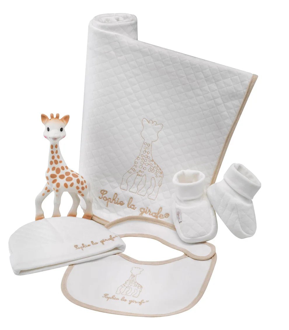 Newborn outfit set with quilted blanket, bib, socks, and small plush giraffe
