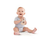 Baby holding natural wood silhouette ring teething toy with cutout handle