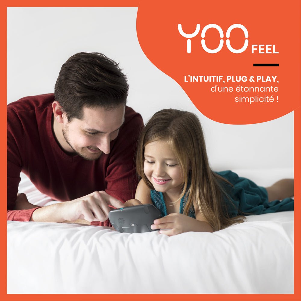 Baby monitor use: parent and child on bed looking at screen tablet