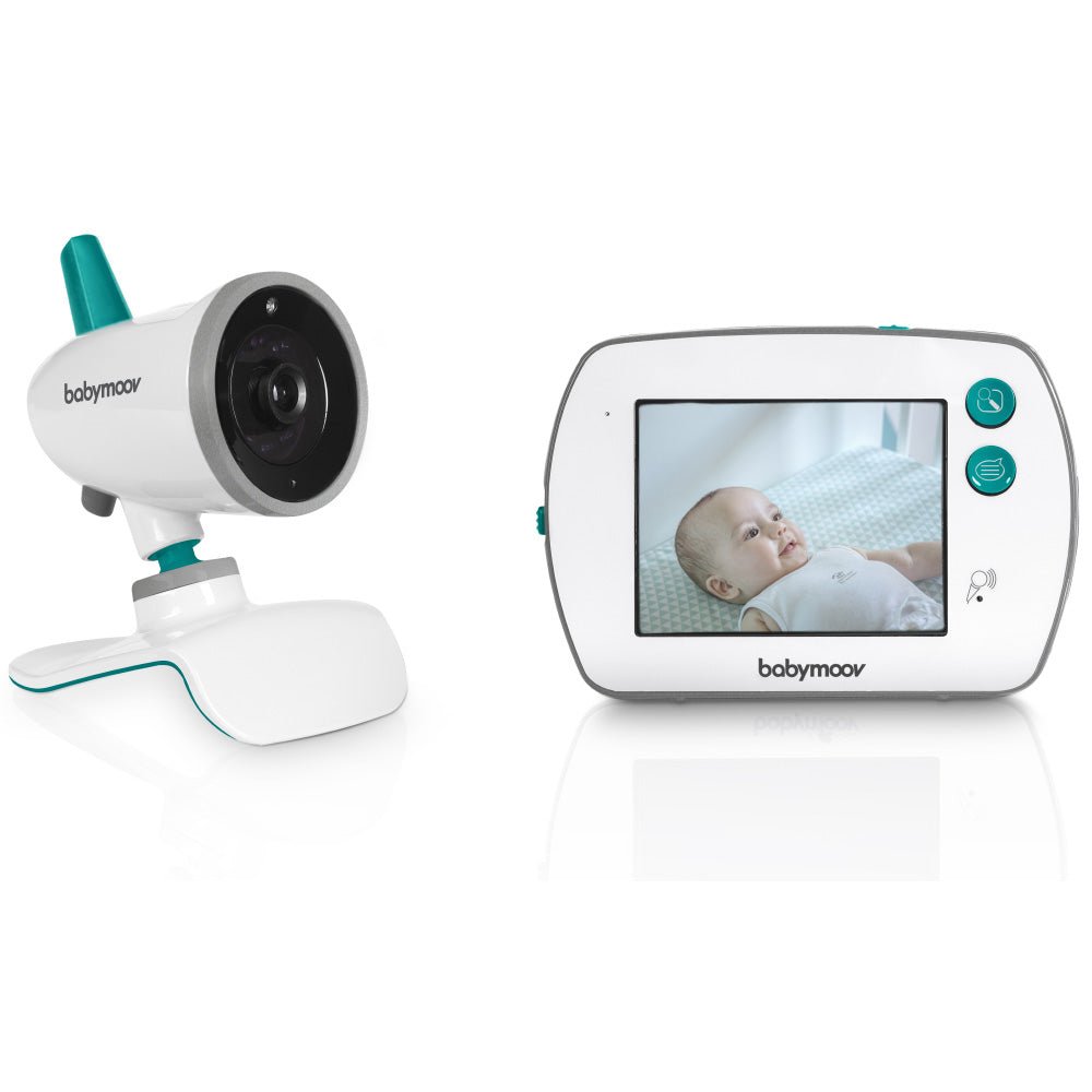 White baby monitor with teal camera and handheld screen displaying baby
