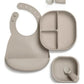 Baby weaning feeding set in light gray: bib, divided plate, small bowl, spoon