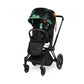 Baby stroller with black seat, green bird-print canopy, and front storage pocket