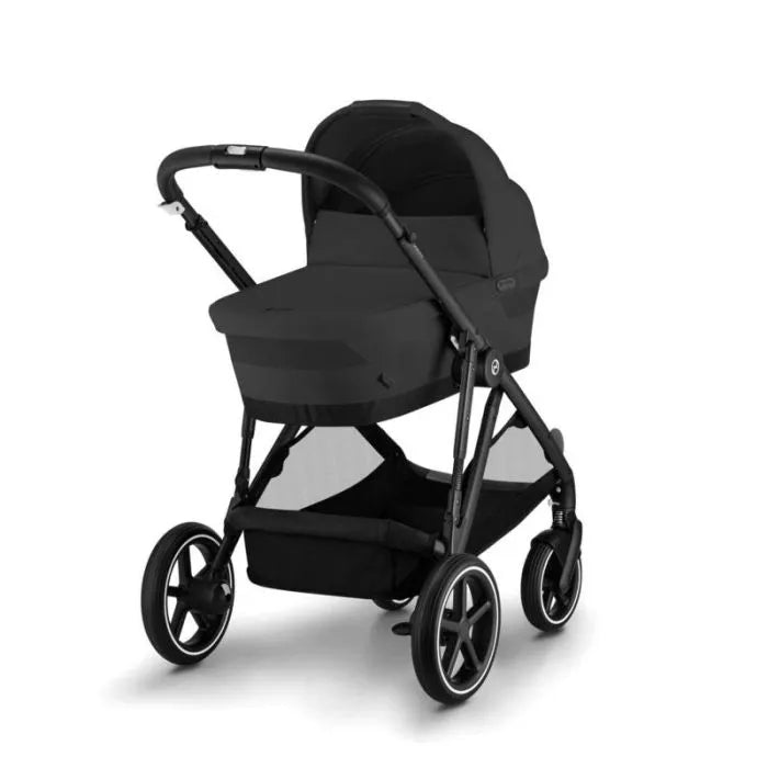 Black bassinet on stroller frame with canopy and four-wheel base