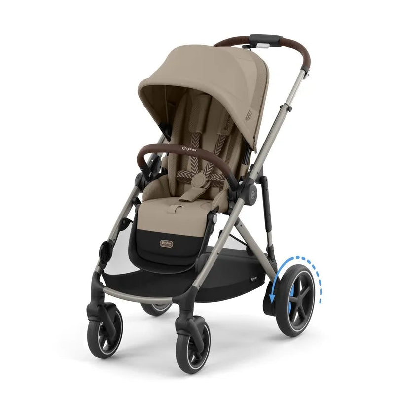 Almond beige stroller in side view with dark tray, canopy up and front swivel wheels